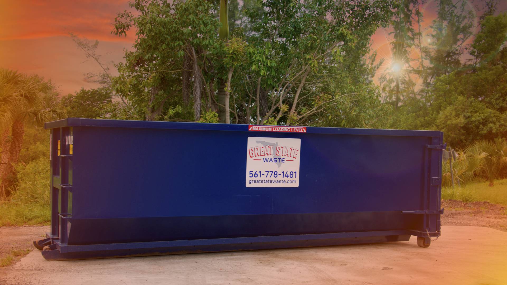 Great State Waste placing dumpster for home renovation cleanup