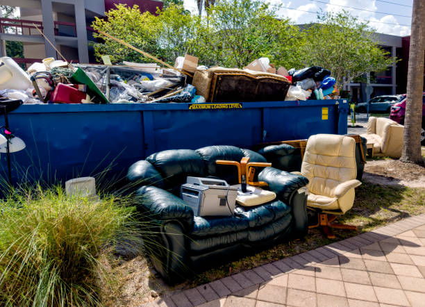 Rubbish removal team clearing unwanted debris from Stuart property<br />
